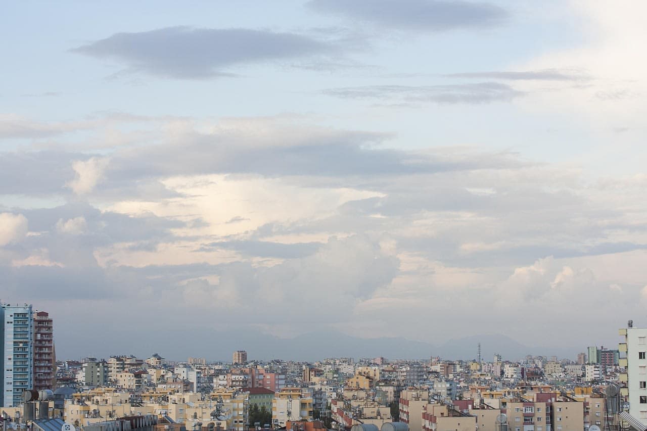 Rooftops and apartment blocks under a cloudy sky in Istanbul