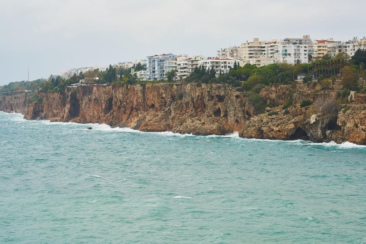 Apartment blocks on a cliff-top above the Mediterranean in Antalya